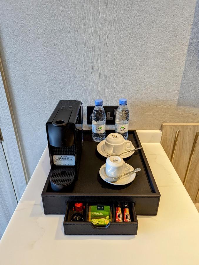 Апарт готель Citadines Абха Екстер'єр фото A Nespresso coffee machine in a hotel room