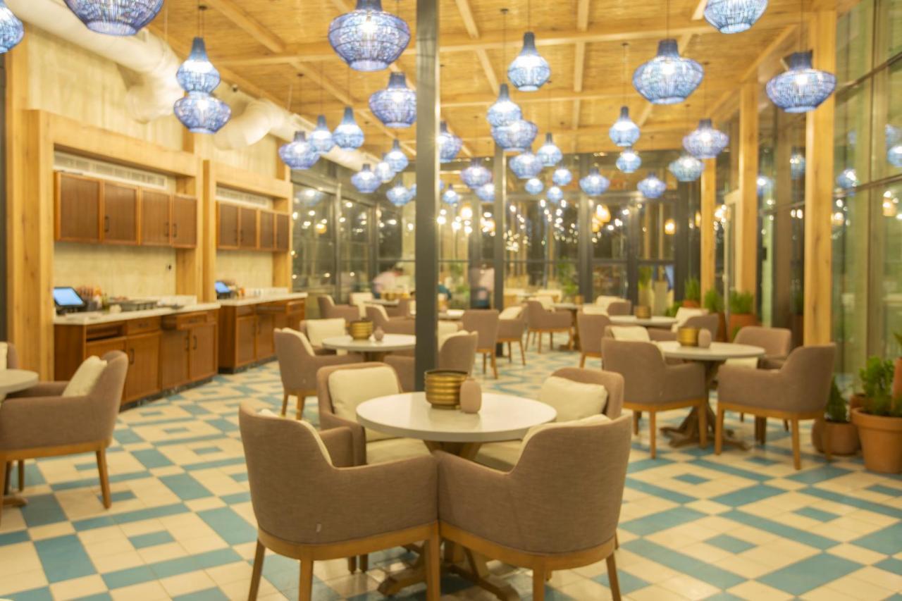 Апарт готель Citadines Абха Екстер'єр фото The interior of the restaurant